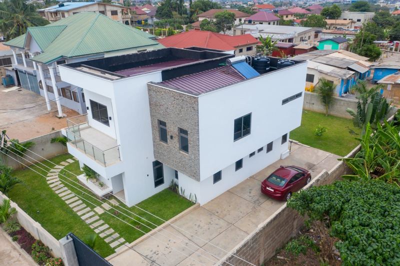 Aerial view of a modern Allonort property and its garden