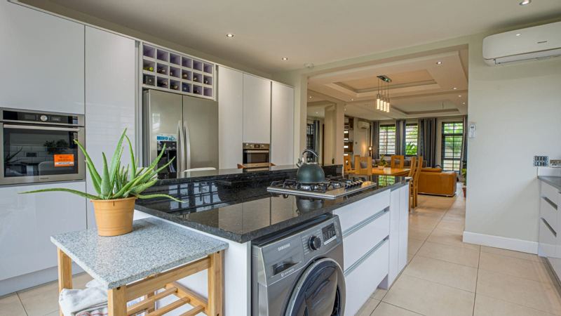 Open-plan kitchen, dining and living area in a modern house